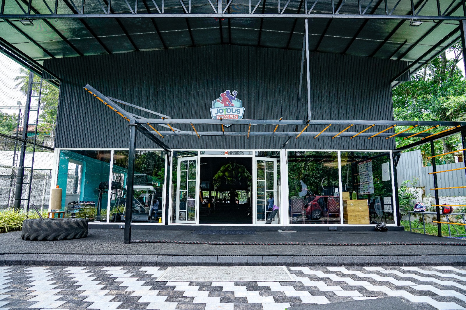 Entrance to Joyous Fitness Park, Arackathara Group's on-site gym