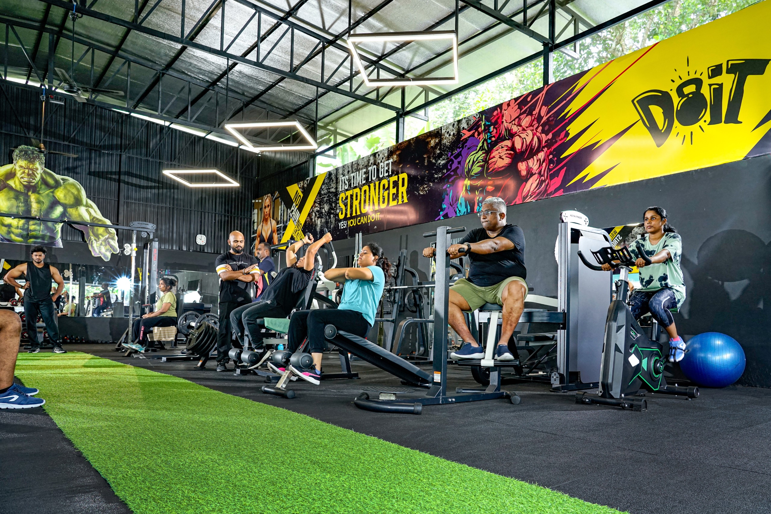 Members training on cardio and resistance machines at Joyous Fitness Park